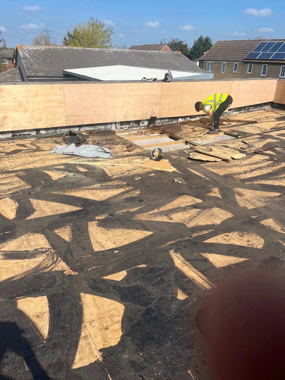 Flat roof stripped back to a new timber deck